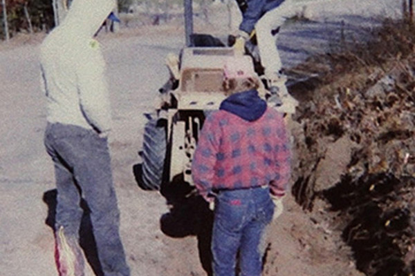 Historic photo of adding in a fiber optic line