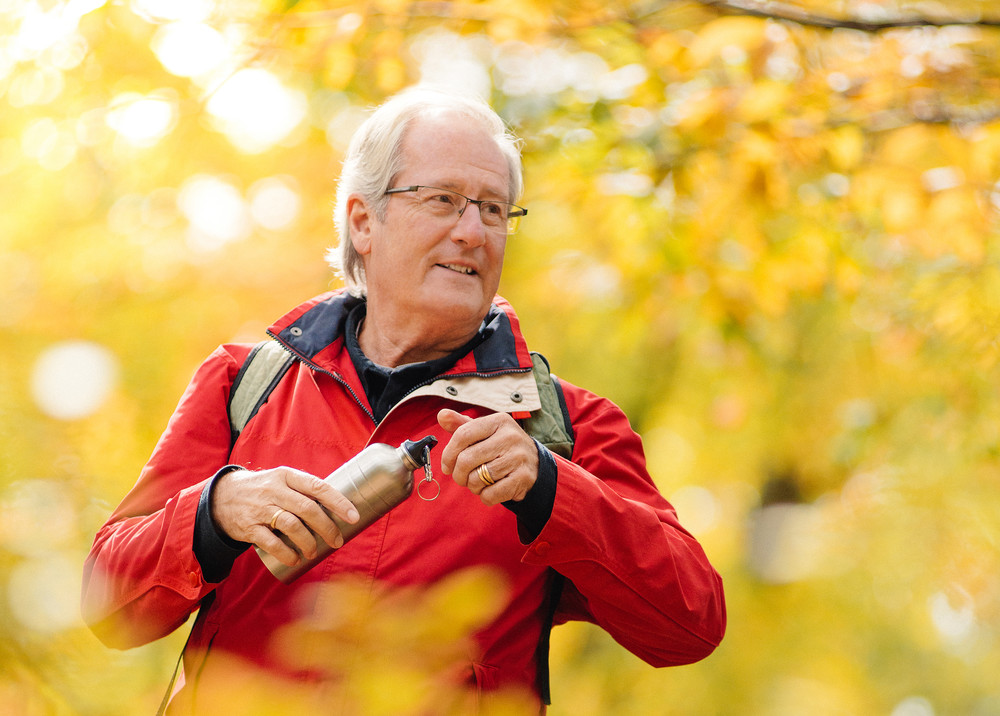 Man in woods in the fall