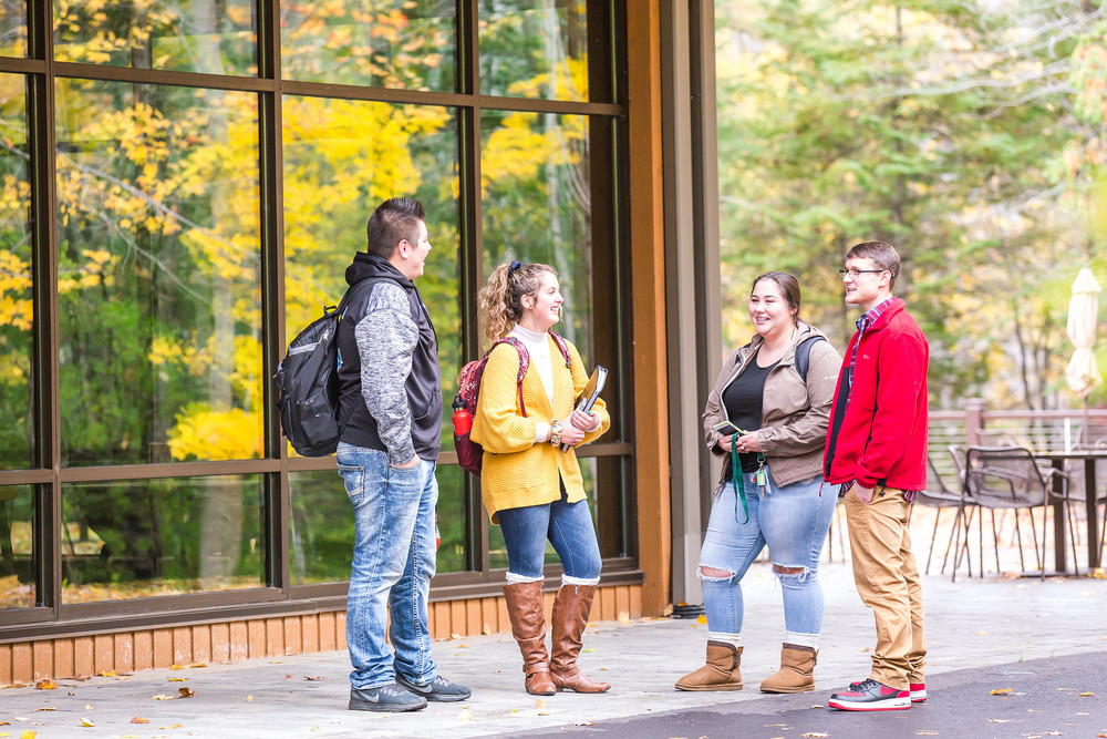 Diverse group of students outside building