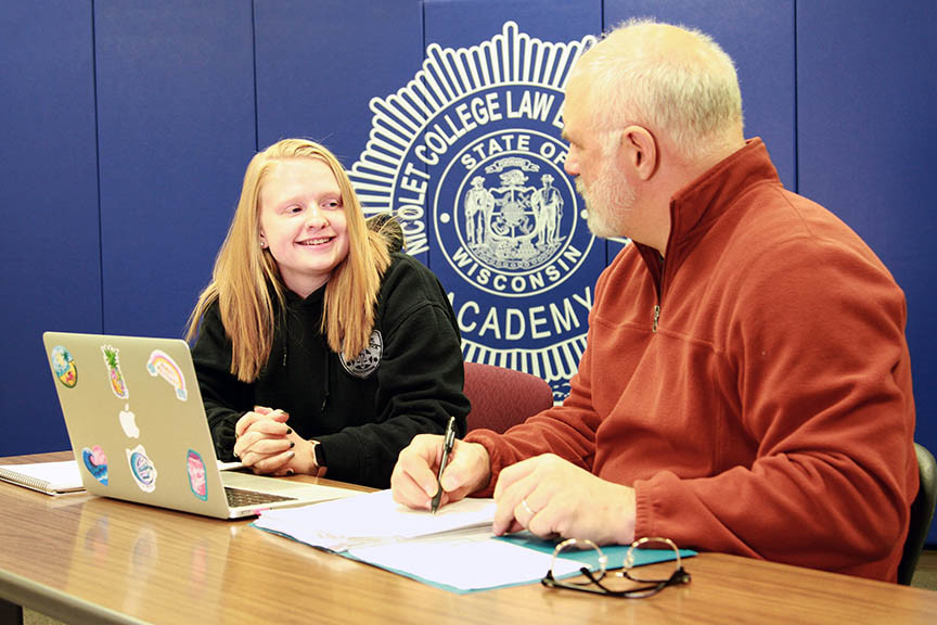 student working with instructor