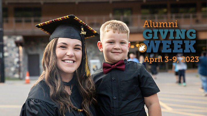 Alumni Shelby Daniels with son at graduation