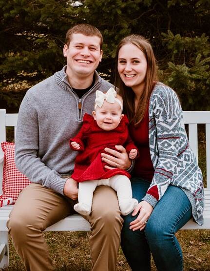 Bobi pictured with partner and daughter