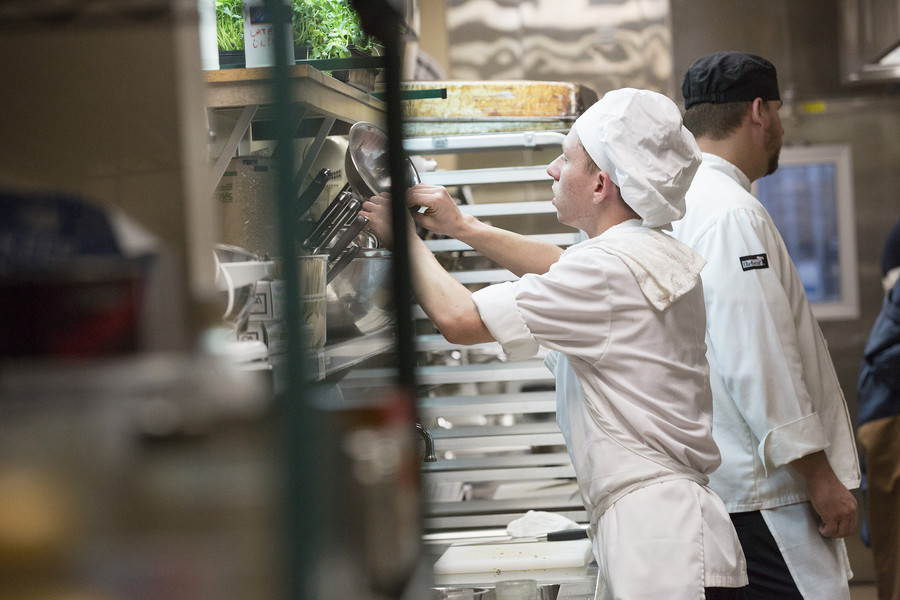 Culinary student preparing in kitchen