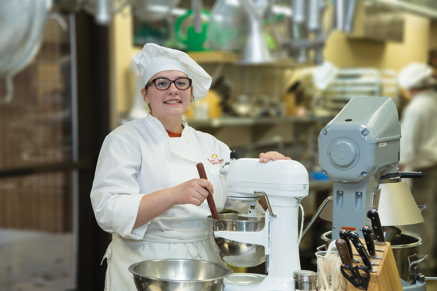 Culinary student with stand mixer